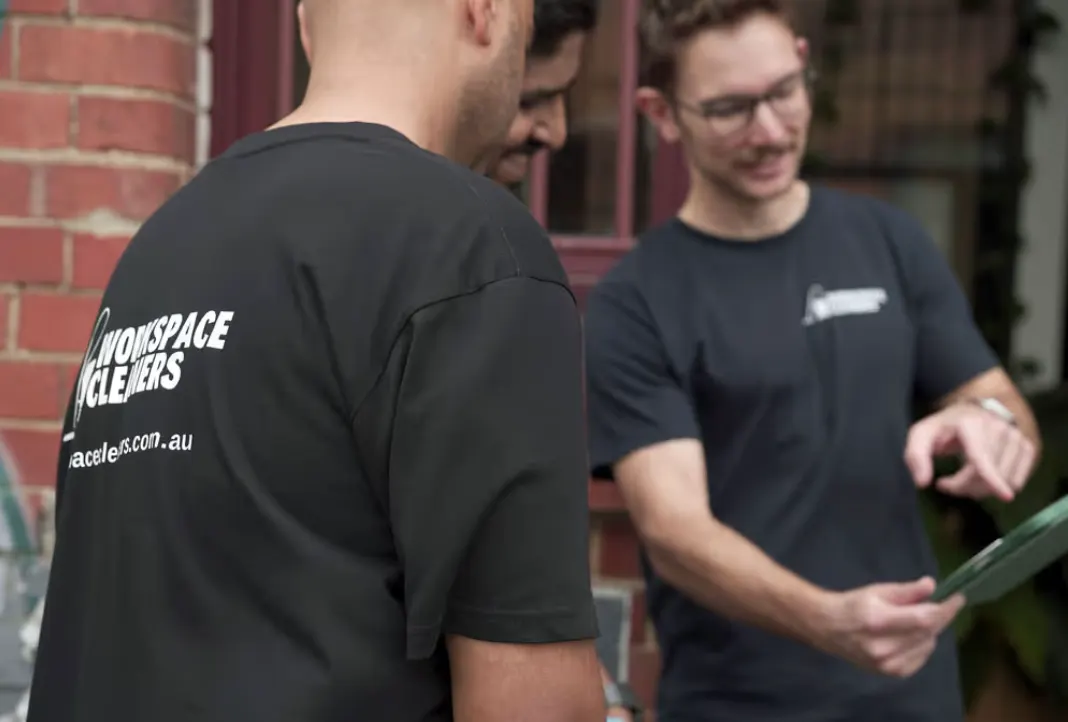 Workspace Cleaners team in branded uniforms